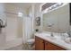 Clean bathroom with tub, shower, and wood vanity at 19661 N Echo Rim Dr, Surprise, AZ 85387