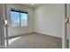 Bright bedroom with window and neutral decor at 19661 N Echo Rim Dr, Surprise, AZ 85387