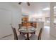 Cozy dining area with a small table and four chairs at 19661 N Echo Rim Dr, Surprise, AZ 85387