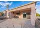 Covered patio with ceiling fan and seating area at 19661 N Echo Rim Dr, Surprise, AZ 85387