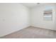 Bedroom with neutral carpet and light filled window at 4244 E Bradford Ave, San Tan Valley, AZ 85140