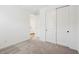 Bedroom with carpet, white walls, and a closet with sliding doors at 4244 E Bradford Ave, San Tan Valley, AZ 85140