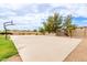 A full basketball court provides ample space for athletic activities in this home at 5312 N Sierra Hermosa Ct, Litchfield Park, AZ 85340