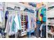 Walk-in closet with rods, shelving, shoe storage, and plenty of storage space for clothing and other belongings at 5312 N Sierra Hermosa Ct, Litchfield Park, AZ 85340