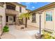Charming front entrance with decorative stonework, desert landscaping, and a welcoming walkway at 5312 N Sierra Hermosa Ct, Litchfield Park, AZ 85340