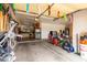 Spacious garage features ample storage, tools, and a variety of equipment at 5312 N Sierra Hermosa Ct, Litchfield Park, AZ 85340