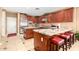 Spacious kitchen boasts stainless steel appliances, granite countertops, and a breakfast bar at 5312 N Sierra Hermosa Ct, Litchfield Park, AZ 85340
