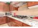 Gourmet kitchen features stainless steel appliances and lots of countertop space at 5312 N Sierra Hermosa Ct, Litchfield Park, AZ 85340