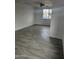 Spacious bedroom featuring gray tile floors and ceiling fan at 2209 E Sheridan St, Phoenix, AZ 85006