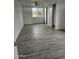 Well-lit bedroom, gray tile floors, and a ceiling fan at 2209 E Sheridan St, Phoenix, AZ 85006