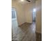 Hallway with tile flooring and access to bedroom and bathroom at 2209 E Sheridan St, Phoenix, AZ 85006