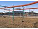 Modern playground with swings and climbing structures at 36813 W La Paz St, Maricopa, AZ 85138