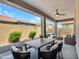 Comfortable covered outdoor dining area with modern furniture, perfect for entertaining guests at 20358 W Calle Encorvada --, Buckeye, AZ 85396