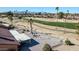 Backyard patio and golf course view from above at 18822 N Grandview Dr, Sun City West, AZ 85375