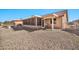 Backyard with covered patio and gravel landscaping at 18822 N Grandview Dr, Sun City West, AZ 85375