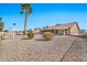 Large backyard with gravel and desert landscaping at 18822 N Grandview Dr, Sun City West, AZ 85375