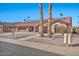 Single-story home with solar panels, desert landscaping at 18822 N Grandview Dr, Sun City West, AZ 85375