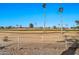 View of the community golf course from behind fence at 18822 N Grandview Dr, Sun City West, AZ 85375