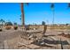 Patio with seating area, overlooking a golf course at 18822 N Grandview Dr, Sun City West, AZ 85375