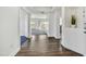 Bright hallway with wood-look floors leading to living areas at 33575 N Dove Lakes Dr # 2028, Cave Creek, AZ 85331