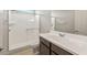 Clean bathroom with a shower/tub combo and modern vanity at 1291 W Treasure Trl, Apache Junction, AZ 85120