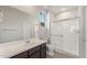 Modern bathroom with shower, toilet, and vanity at 1449 W Saddle Run, Apache Junction, AZ 85120