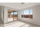 Bright dining area with sliding glass doors leading to backyard at 1449 W Saddle Run, Apache Junction, AZ 85120