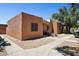Southwest-style home with desert landscaping, walkway and mature shade trees at 15601 N 27Th St # 7, Phoenix, AZ 85032