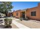 Southwest style home with desert landscaping, a covered entry, and a tan colored stucco exterior at 15601 N 27Th St # 7, Phoenix, AZ 85032