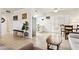 Living room featuring an open layout, tile flooring, and connections to the kitchen and dining areas at 15601 N 27Th St # 7, Phoenix, AZ 85032