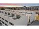 Aerial view of modern townhouses, showcasing rooftop decks at 312 E Windsor Ave # 11, Phoenix, AZ 85004