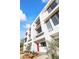 Contemporary building exterior with red door and landscaping at 312 E Windsor Ave # 11, Phoenix, AZ 85004