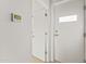 Clean hallway with white doors and light wood floors at 312 E Windsor Ave # 11, Phoenix, AZ 85004