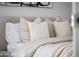 Neutral-toned main bedroom with cozy bedding at 312 E Windsor Ave # 11, Phoenix, AZ 85004