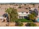 Backyard oasis with a covered patio, putting green, and sparkling pool at 4503 E Decatur St, Mesa, AZ 85205