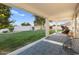 Enjoy the view from this covered patio, spacious backyard and mature orange tree at 4503 E Decatur St, Mesa, AZ 85205