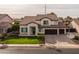 Two story home with a landscaped lawn and two car garage at 4503 E Decatur St, Mesa, AZ 85205