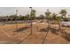 Sand volleyball court with surrounding park amenities at 4503 E Decatur St, Mesa, AZ 85205