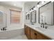 Modern bathroom with double vanity, soaking tub and shower at 41432 N Bent Creek Way, Phoenix, AZ 85086