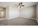 Bedroom with neutral carpet and ceiling fan at 41432 N Bent Creek Way, Phoenix, AZ 85086