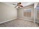 Bright bedroom with carpet flooring and ceiling fan at 41432 N Bent Creek Way, Phoenix, AZ 85086