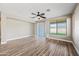 Gathering room with hardwood floors and sliding glass doors at 41432 N Bent Creek Way, Phoenix, AZ 85086