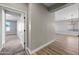 Hallway with neutral walls and wood-look floors at 41432 N Bent Creek Way, Phoenix, AZ 85086