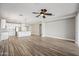 Living area with hardwood floors and open kitchen view at 41432 N Bent Creek Way, Phoenix, AZ 85086