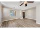 Living room with hardwood floors and large window at 41432 N Bent Creek Way, Phoenix, AZ 85086