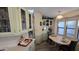 Charming dining area with built-in cabinets and an abundance of natural light at 17200 W Bell Rd # 569, Surprise, AZ 85374