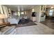 Inviting living room with large windows and comfortable seating arrangement at 17200 W Bell Rd # 569, Surprise, AZ 85374
