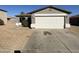 One story house with a two-car garage and gravel driveway at 1244 E Desert Rose Trl, San Tan Valley, AZ 85143