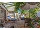 Inviting backyard patio with comfortable seating, shaded pergola, and lush greenery creating a private oasis at 8101 N Central Ave # 6, Phoenix, AZ 85020