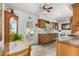 Country-style kitchen features a door to the patio, wood cabinets, and stainless appliances at 8101 N Central Ave # 6, Phoenix, AZ 85020